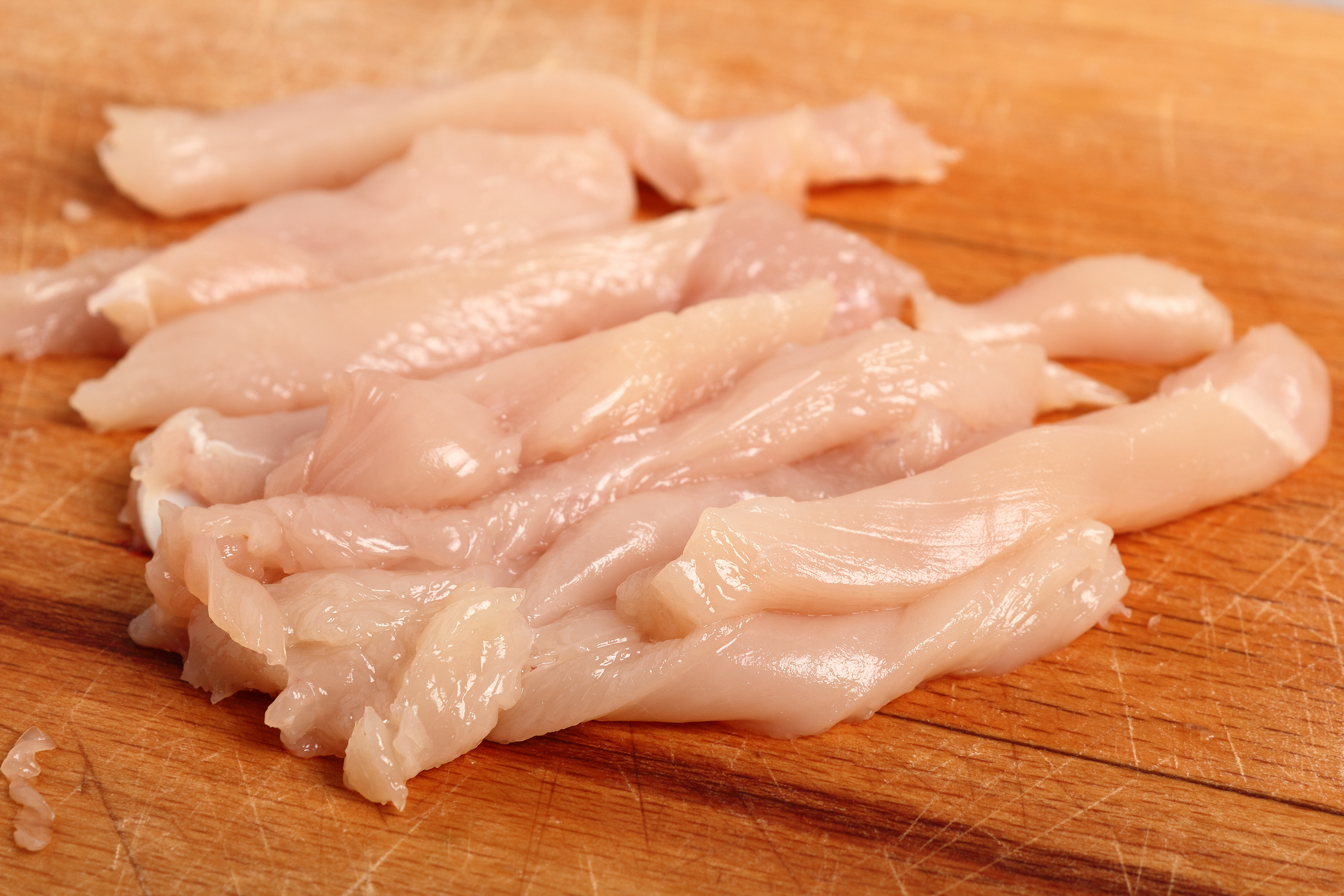 Chop your chicken into strips. | Source: Shutterstock