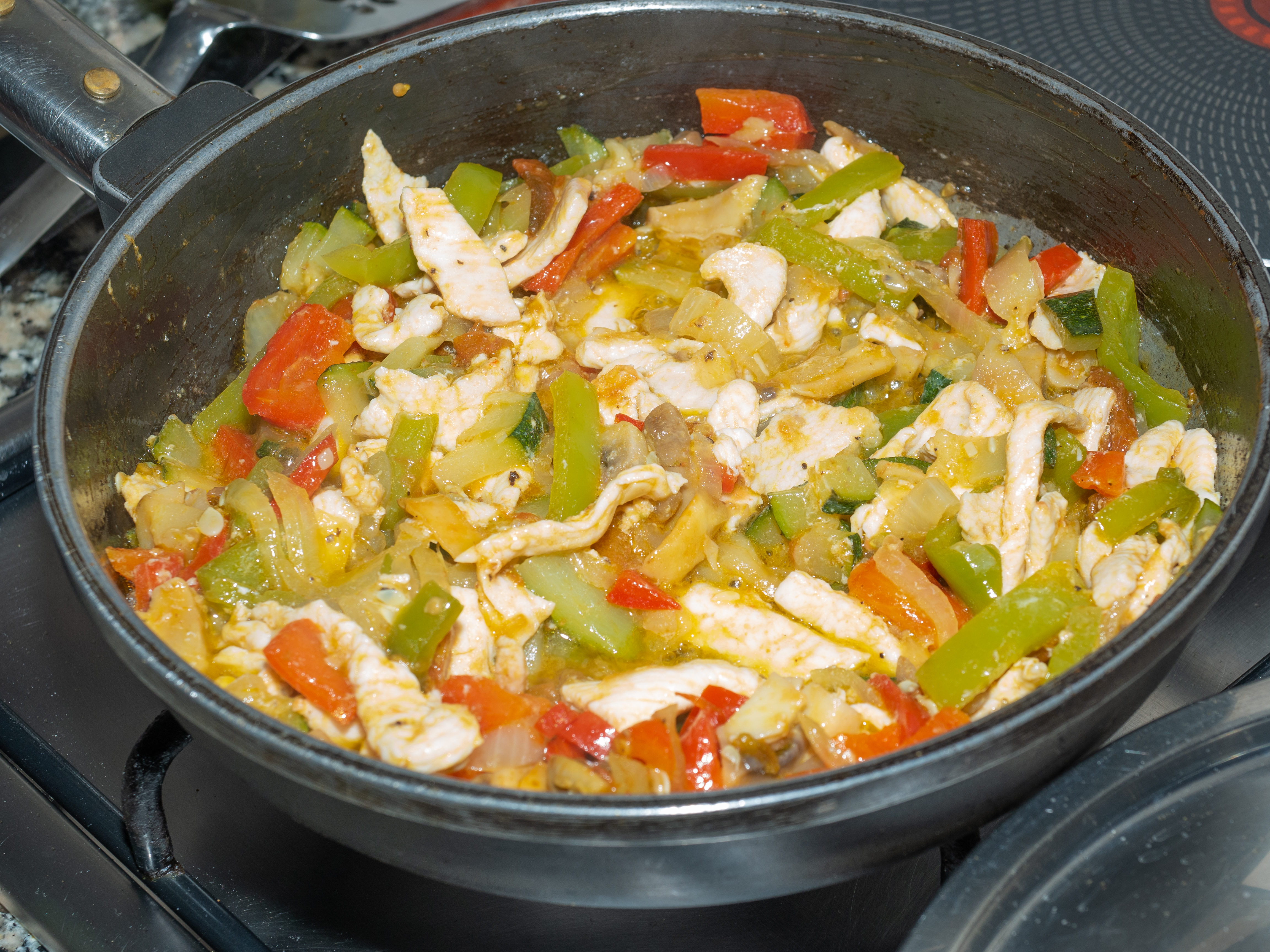 Add your vegetables and let them cook along with your chicken. | Source: Shutterstock